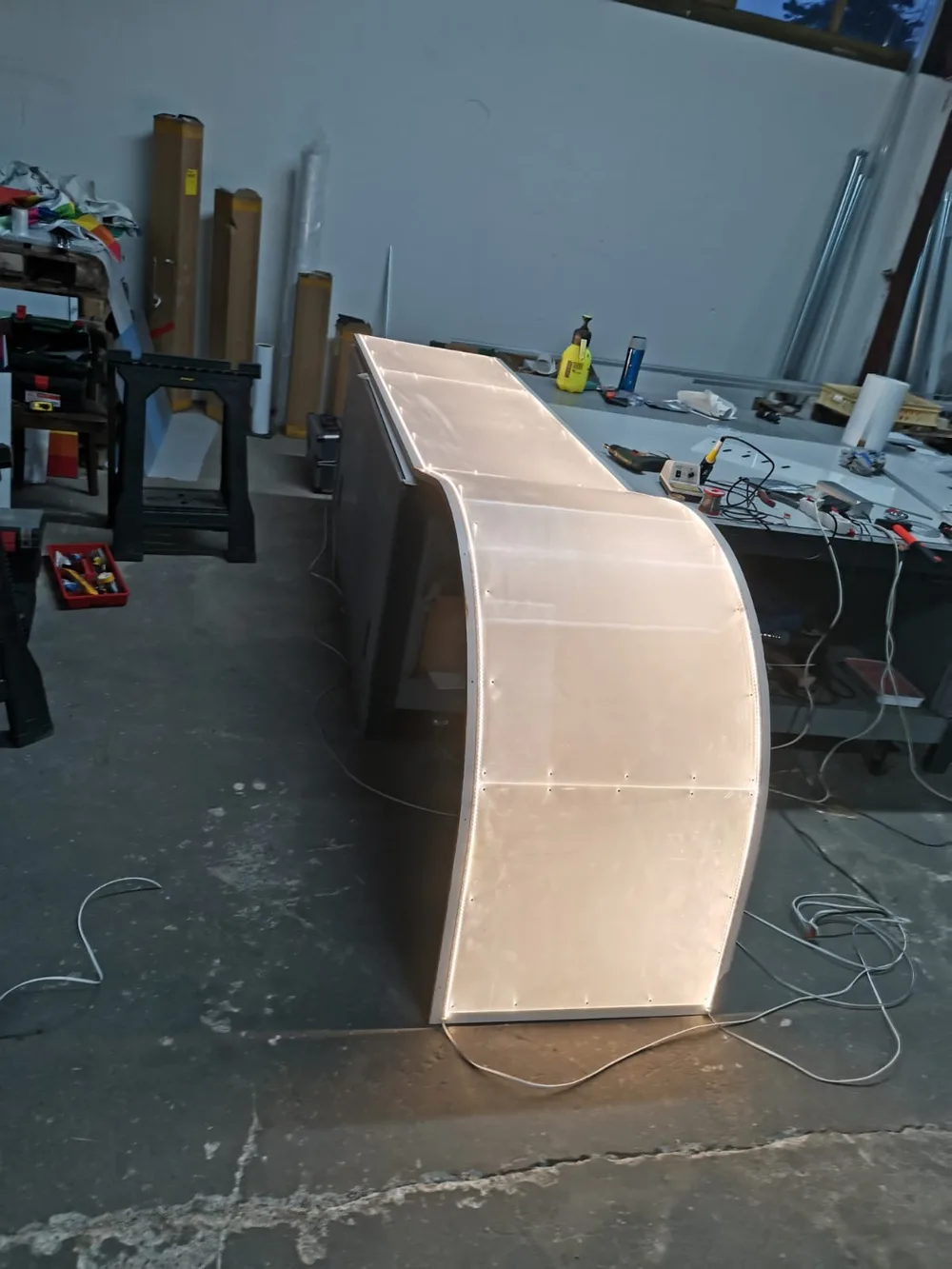 Producing a curved backlit reception element
